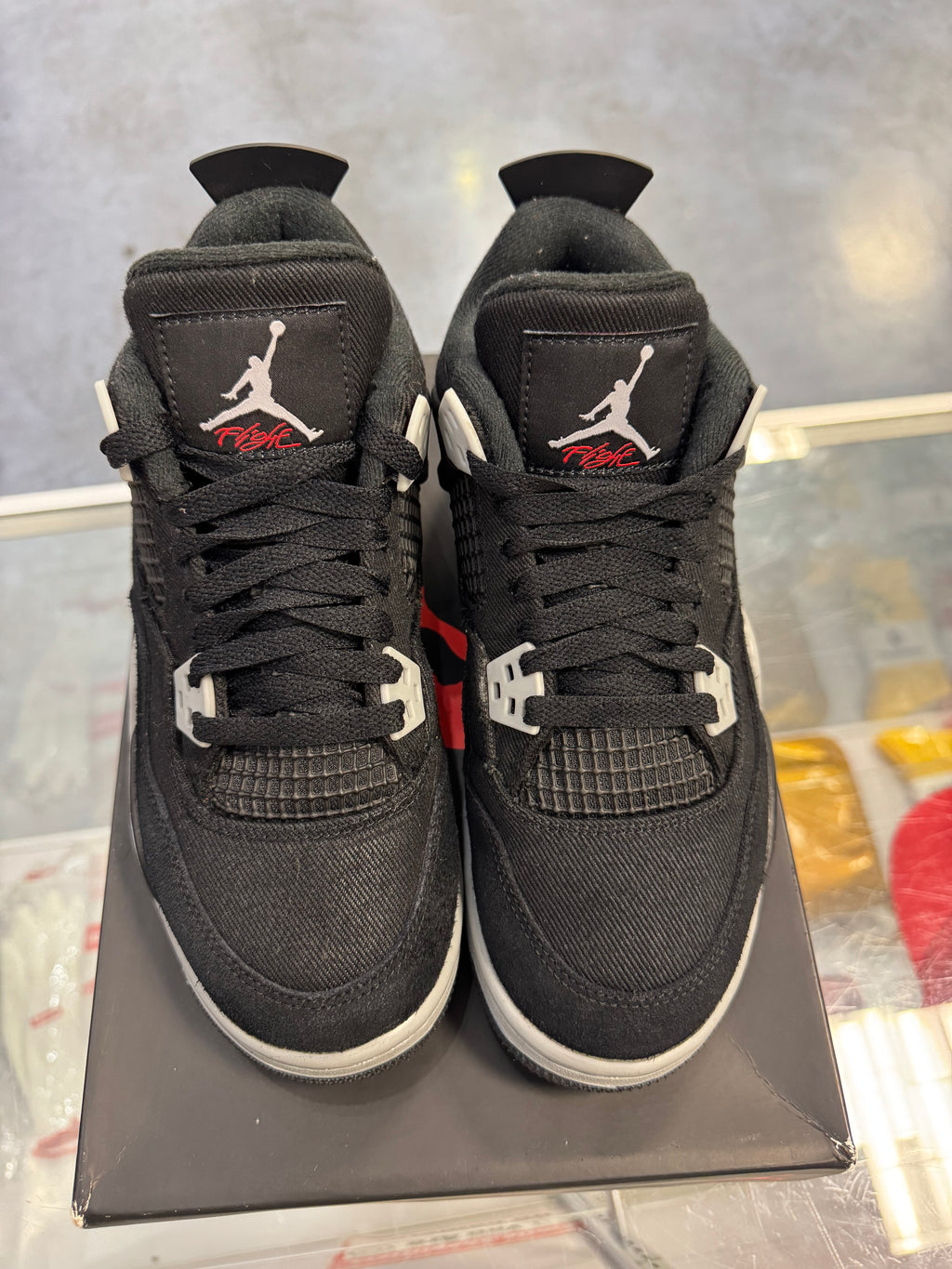 Preowned Black Canvas Jordan 4