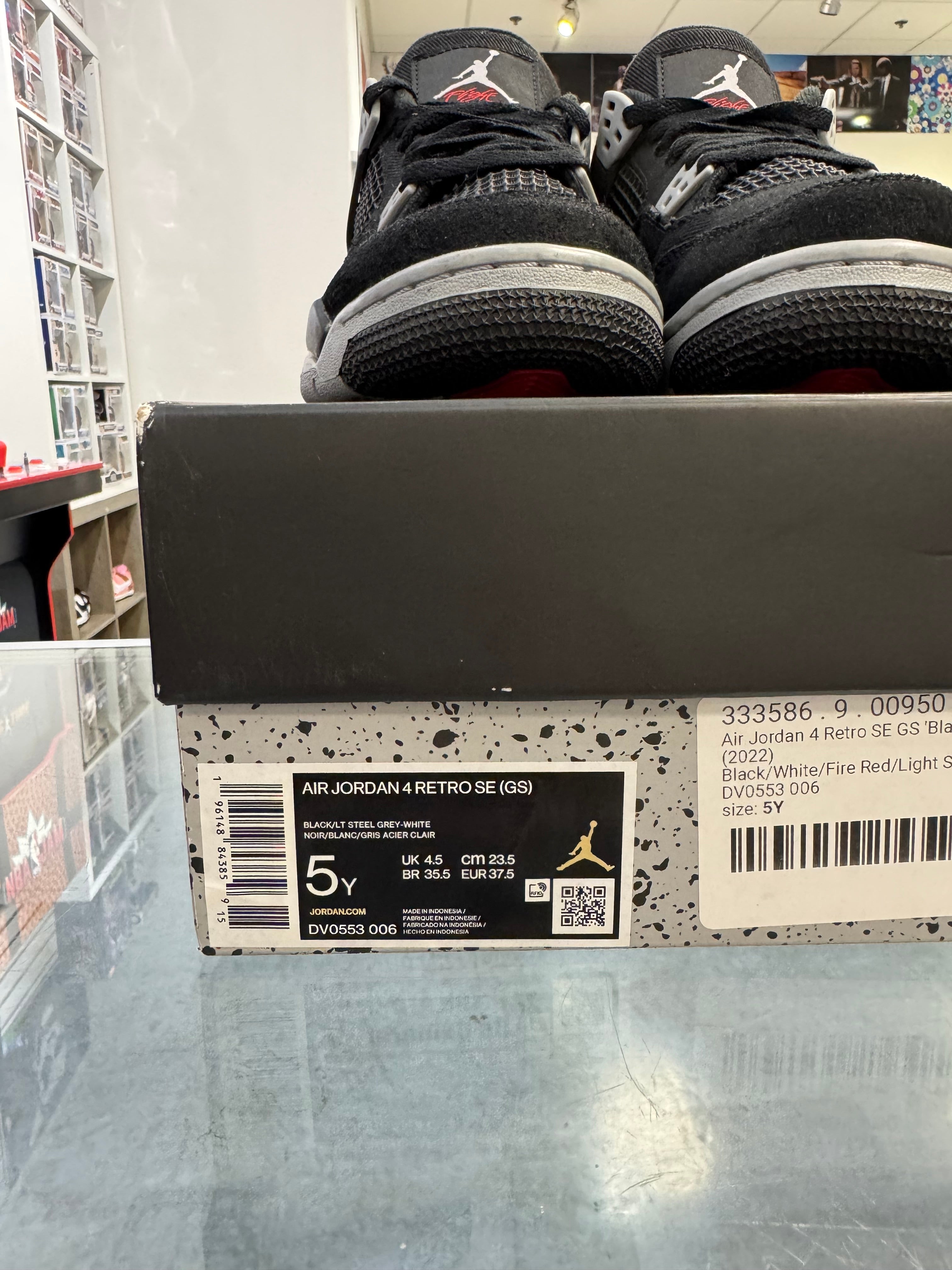 Preowned Black Canvas Jordan 4