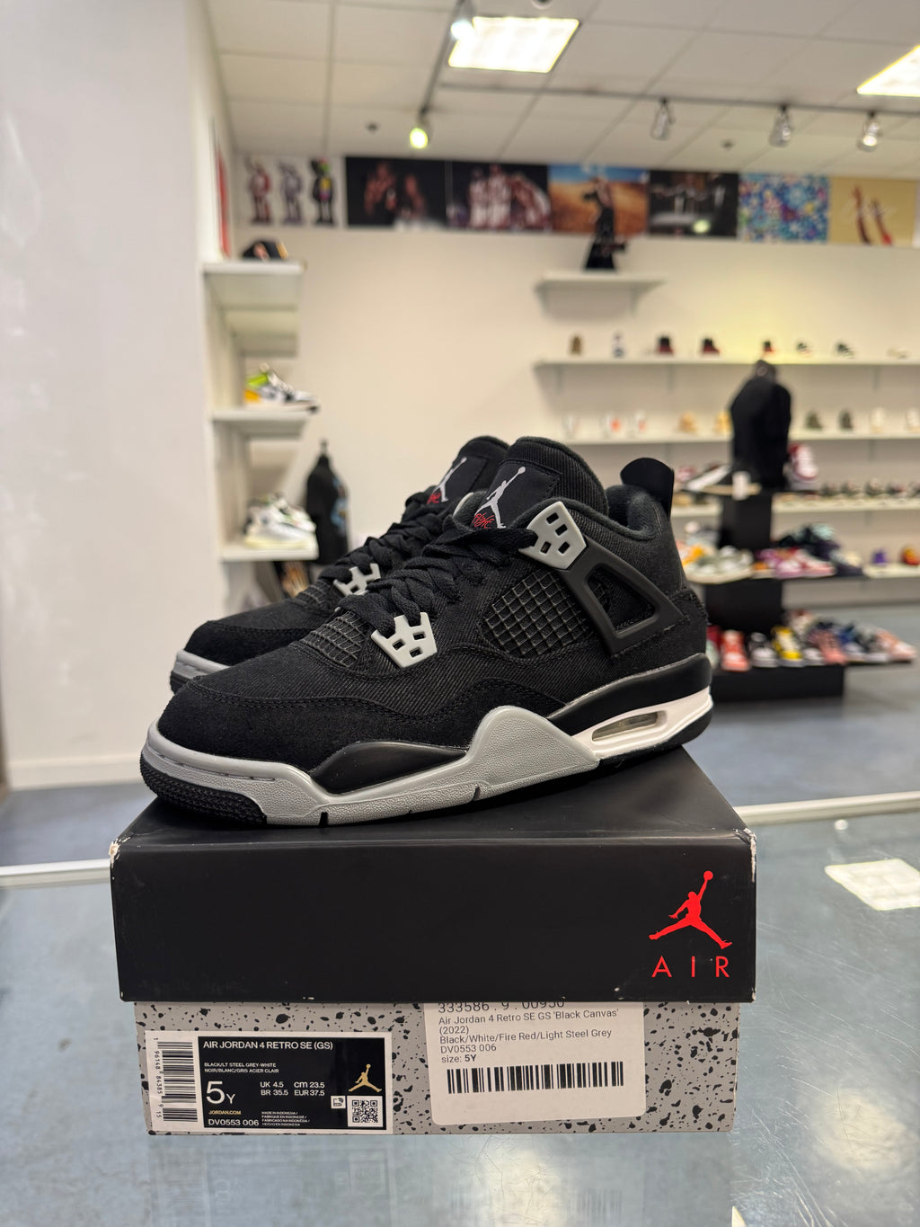 Preowned Black Canvas Jordan 4